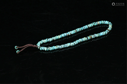 A STRING OF TURQUOISE DECORATION