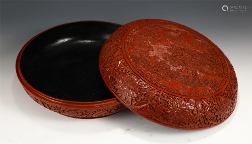A CIRCULAR CARVED RED LACQUER BOX AND COVER
