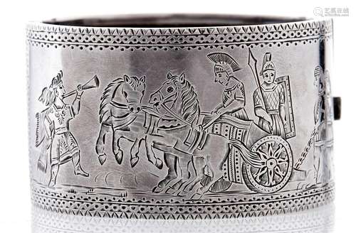 A Victorian silver bangle, c1880, engraved with a charioteer...