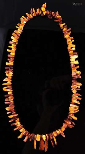 An amber necklace, 119g