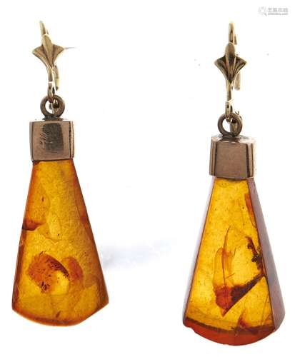 A pair of amber earrings, in gold marked 14k, 3.8g Good cond...