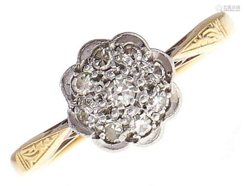 A diamond cluster ring, in gold marked 18ct PLAT, 2.7g, size...