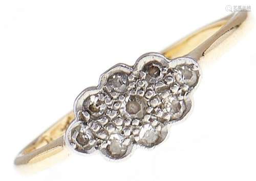 A diamond cluster ring, in gold marked 18ct PLAT, worn, 2g, ...