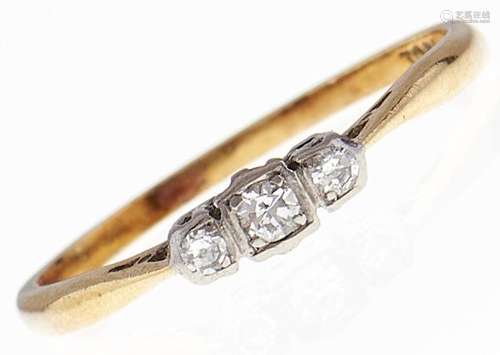 A three stone diamond ring, in gold marked 18ct, 2g, size O ...