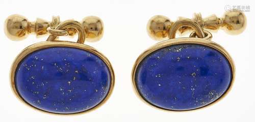 A pair of lapis lazuli cufflinks en cabochon, in 18ct gold, ...