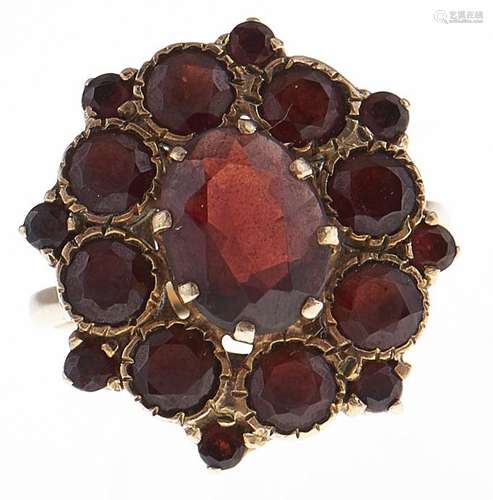 A garnet cluster ring, in 9ct gold, 4.8g, size L Hoop slight...