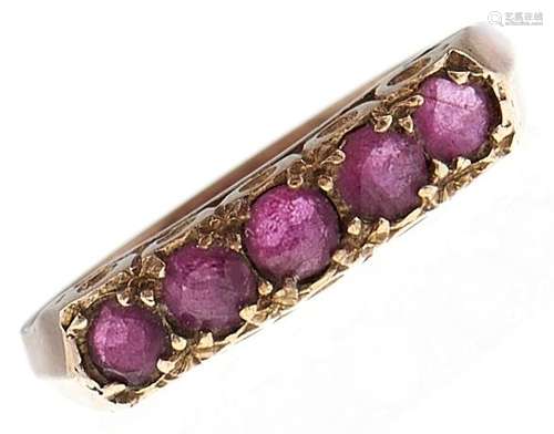 A five stone ruby ring, in 9ct gold, 2.5g, size O Good condi...