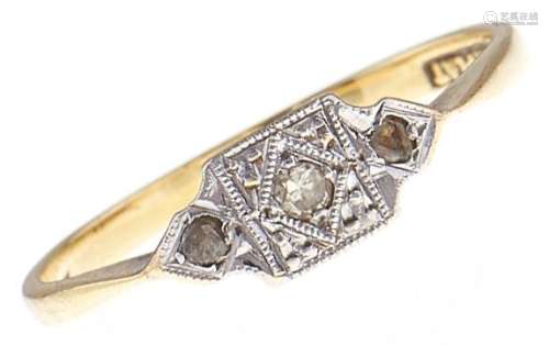 A three stone diamond ring, in gold marked 18ct & PLAT, 1.6g...