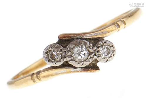 A three stone diamond ring, in gold, marks rubbed, 2.3g, siz...