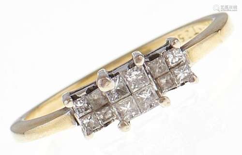 A twelve stone diamond ring with princess cut diamonds, in 1...