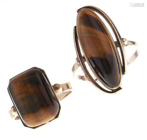 Two tiger's eye rings, in gold marked 9ct, 11.9g, sizes T an...