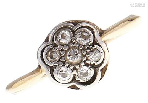 A diamond cluster ring, in gold marked 18ct PLAT, 1.9g, size...