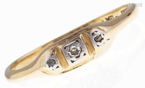 A three stone diamond ring, in gold marked 18ct PLAT, 2g, si...
