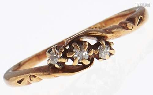 A three stone diamond ring, in 18ct gold, 1.9g, size L Wear ...