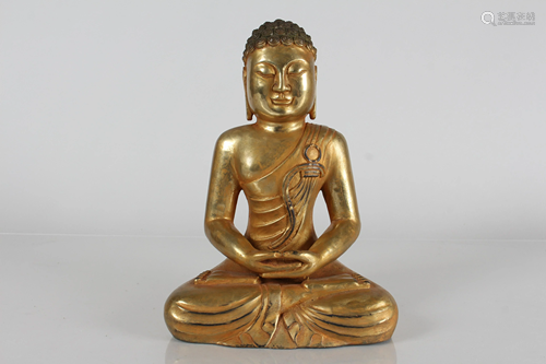 A Chinese Religious Gilt Fortune Buddha Statue