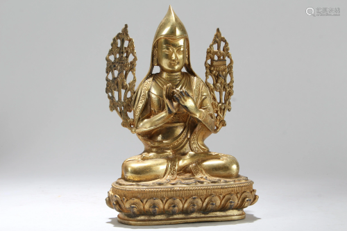 A Chinese Gilt Religious Fortune Buddha Statue