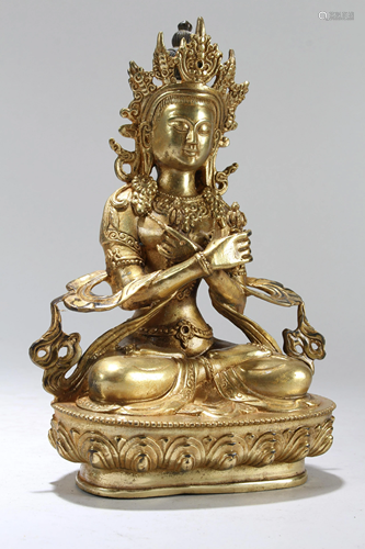 A Chinese Gilt Religious Fortune Buddha Statue