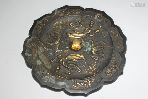 A Chinese Cutting-edge Bronze Mirror