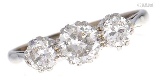 A three stone diamond ring, with old cut diamonds that to th...
