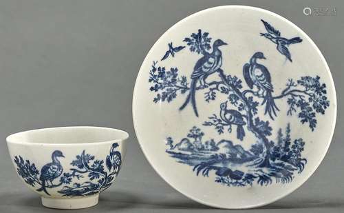 A Worcester blue and white tea bowl and saucer, c1780, trans...