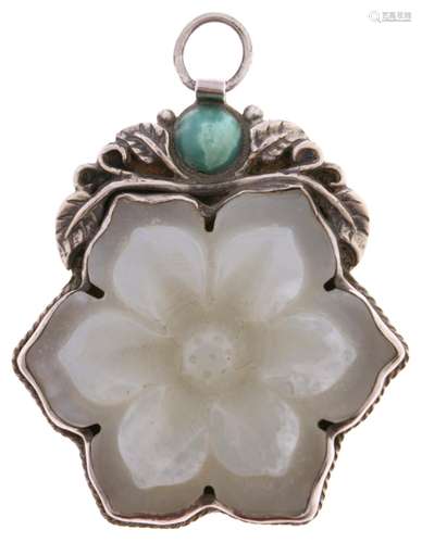 A Chinese celadon jade flower pendant, early 20th c, the cha...