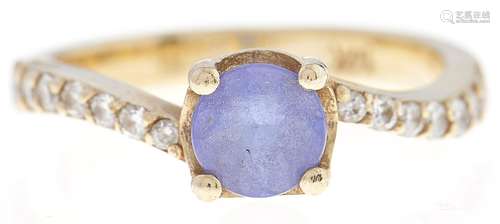 A tanzanite and diamond ring, in gold marked 14k, 3.9g, size...