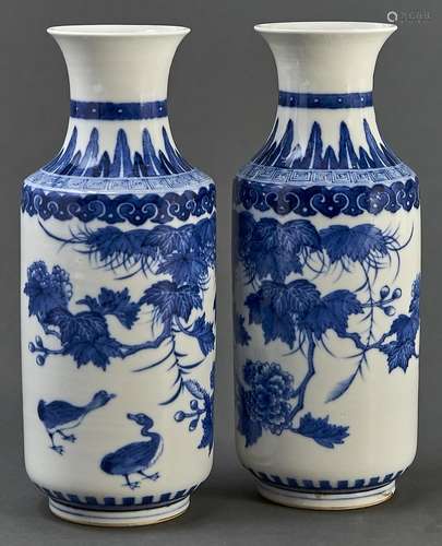 A pair of Chinese blue and white cylindrical vases, with wai...