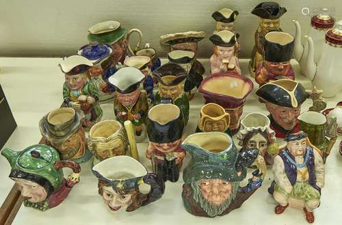 A collection of Royal Doulton, Beswick and other Toby jugs a...