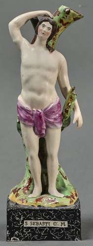 A Staffordshire earthenware figure of St. Sebastian, c1825-3...