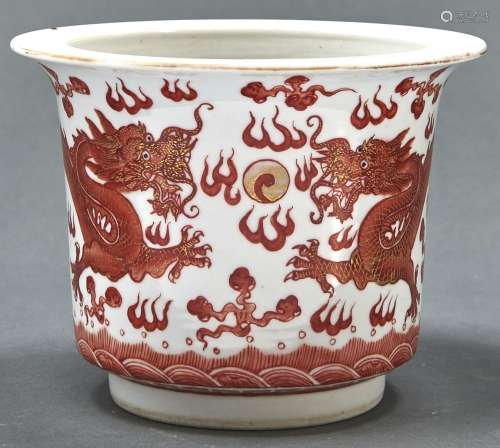 A Chinese iron red decorated porcelain dragon jardiniere, 10...