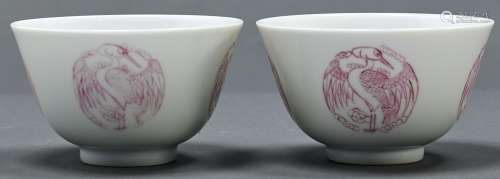 A pair of Chinese porcelain bowls, painted in pale rose enam...