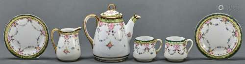 A Noritake tea service for two, c1930, decorated with roses ...