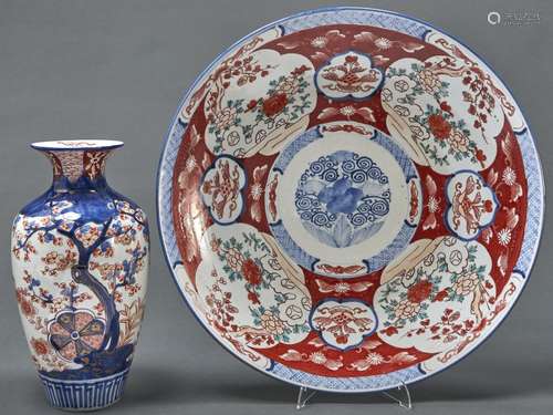 A Japanese Imari dish, Meiji period, with underglaze blue pa...