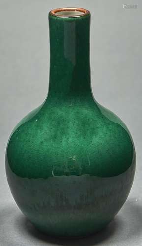 A Chinese green monochrome glazed vase, of bottle shape, 17c...