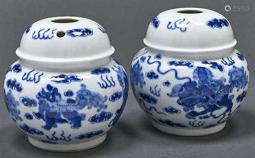 A pair of Chinese blue and white opium type vases, painted w...