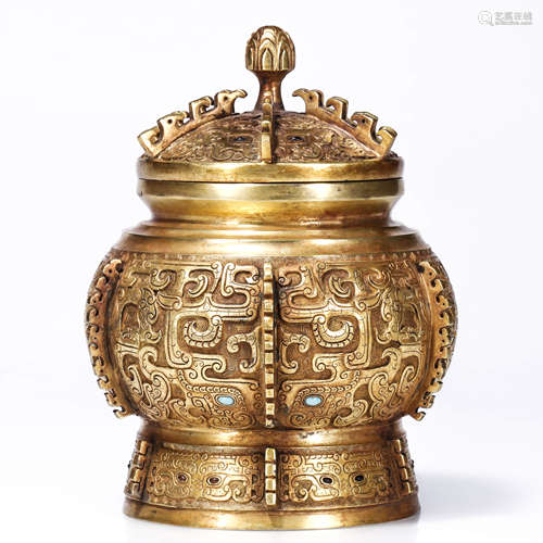 A Chinese Gilt-Bronze Taotie Mask Vessel and Cover