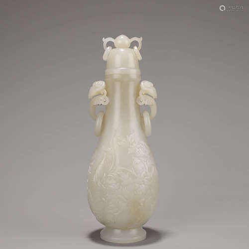 A Chinese White Jade Bird and Floral Vase and Cover