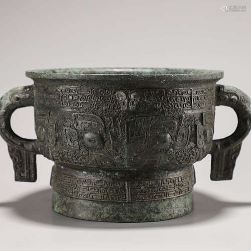 A Chinese Bronze Taotie Mask Vessel, Gui