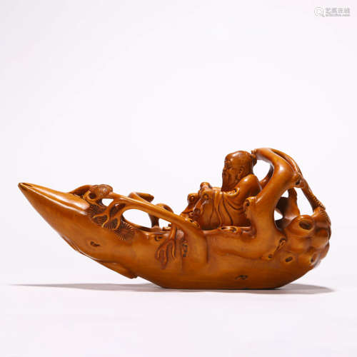 A Chinese Boxwood Carving of an Immortal on a Boat