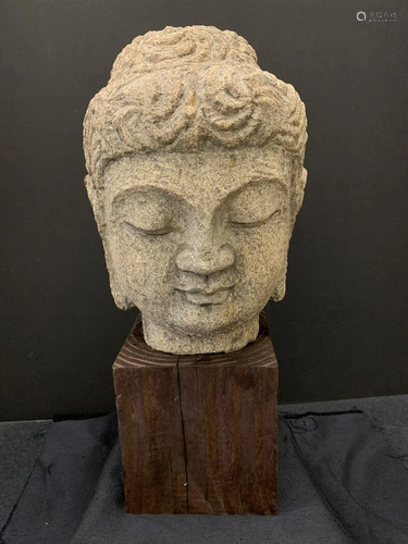 Buddha head- stone with base