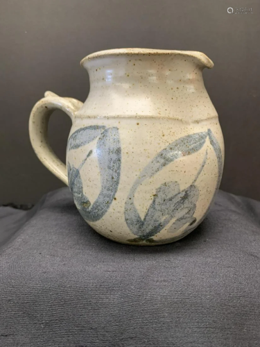 Signed art pottery pitcher