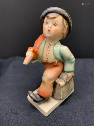 Porcelain figurine of a boy- Hummel