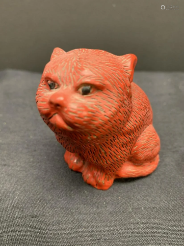 Sculpture of a cat- red