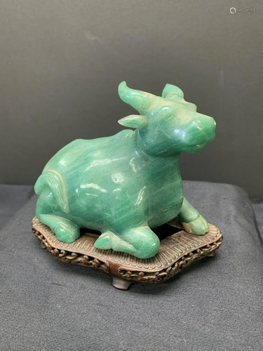 Jade carving of ox with base