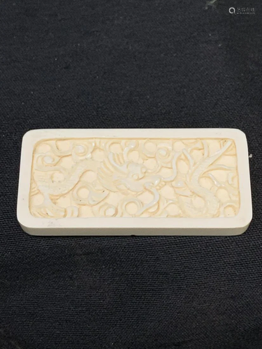 Netsuki bone carving of a dragon