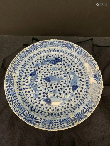 Blue and white plate with a mark - fish