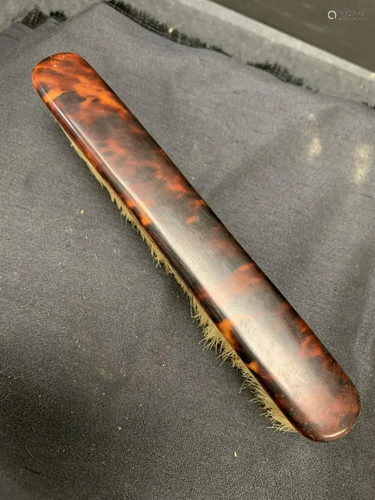 Tortoise shell brush