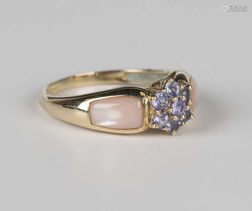 A 9ct gold, tanzanite and pink stained mother-of-pearl clust...