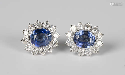 A pair of white gold, sapphire and diamond cluster earstuds,...