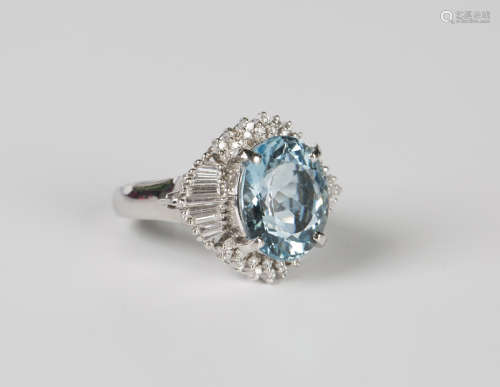 A platinum, aquamarine and diamond ring, claw set with the l...